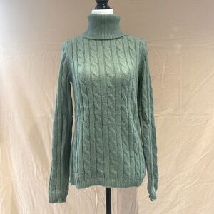 Cableknit turtleneck sweater